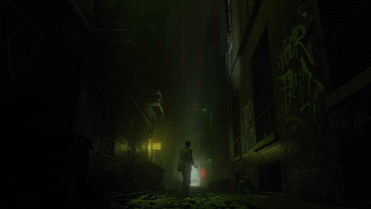 Alan Wake zseblámpával a kezében egy sötét sikátorban a Sötét Helyen